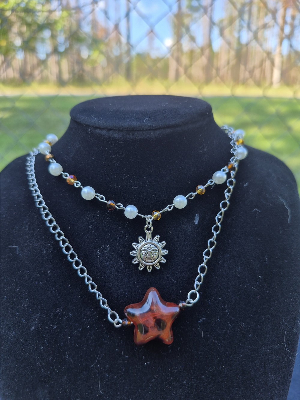 Layered Sun Charm and Amber Star Necklace - Silver Tone